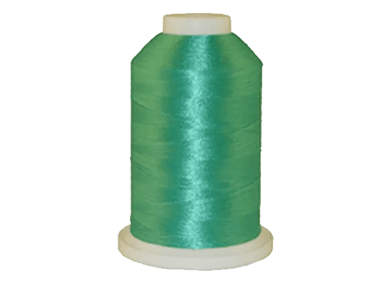Brother teal embroidery thread spool with glossy finish on white background