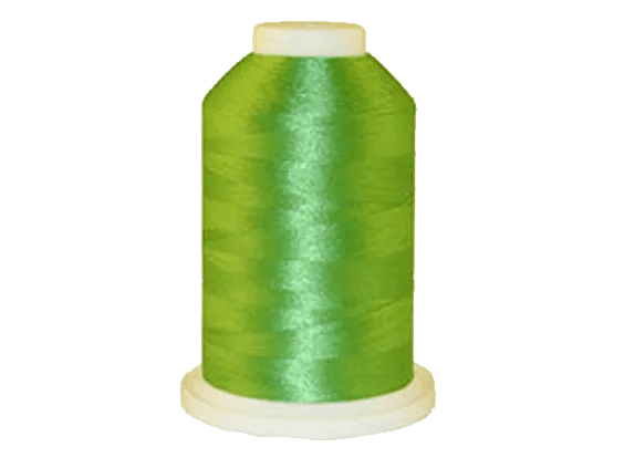 Brother embroidery thread spool in vibrant green with glossy finish on white base