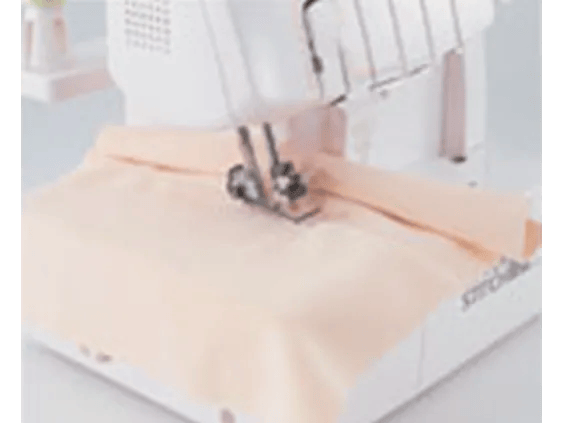 Brother serger sewing peach fabric with overlock stitch