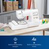 Brother PE570 embroidery machine with LCD screen and floral design in hoop on craft table