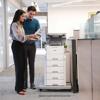 Brother HL-EX415DW laser printer with optional paper trays in modern office workspace