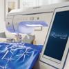 Brother Luminaire 2 Innov-is XP2 sewing and embroidery machine stitching blue fabric in home workspace