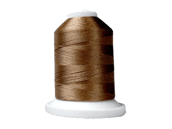 Brother embroidery thread spool in bronze on white cone