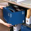 Brother TN-850 high-yield toner cartridge 2-pack being stored in office desk drawer