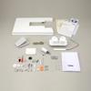 Brother BQ2500 sewing machine accessory kit with presser feet, bobbins, needles, and manual