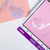 Brother cutting mat with decorative cut designs on pink and peach cardstock