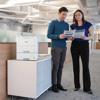 Brother HL-L6415DWT monochrome laser printer with dual paper trays in modern office setting