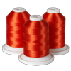 Three spools of red embroidery thread on white bases for Brother sewing machines