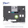 Brother P-touch TZe tape cartridge, 12mm clear with strong adhesive, showing labeled samples