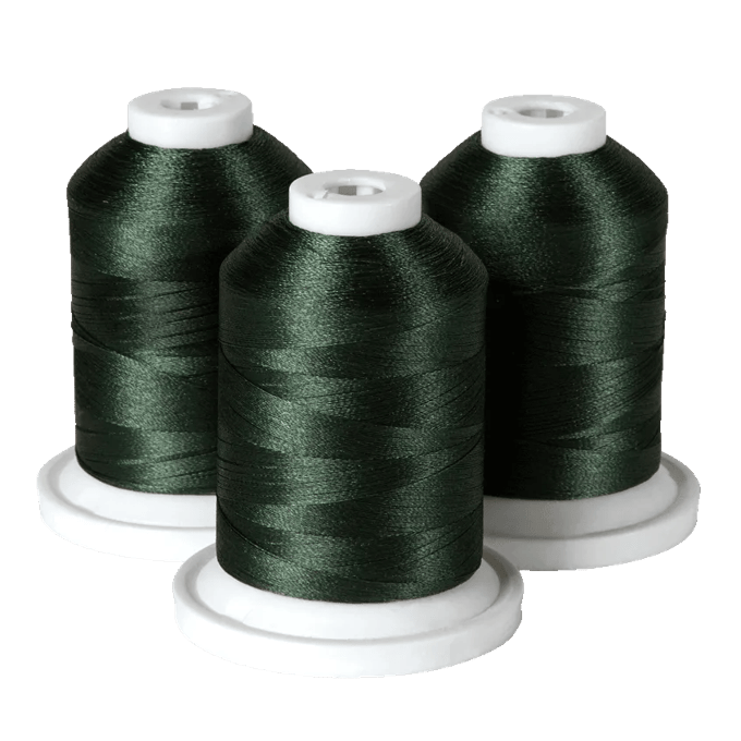 Three dark green embroidery thread spools on white bases