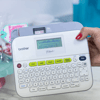 Brother P-touch desktop label maker with QWERTY keyboard and backlit display