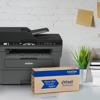 Brother MFC-L2690DW all-in-one laser printer with Refresh toner subscription box on desk
