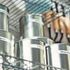Brother label maker tape organizing kitchen spice jars on wire shelf