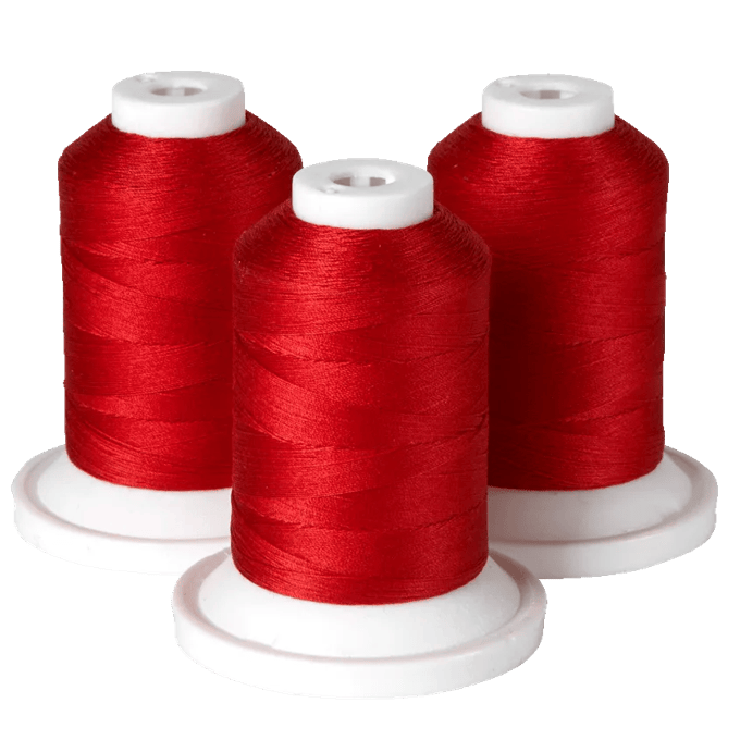 Three red embroidery thread spools on white bases for Brother sewing machines