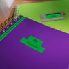 Brother all-in-one printer with wireless display on desk with colorful notebooks