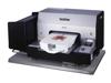 Brother GT-541 garment printer printing colorful floral design on white t-shirt
