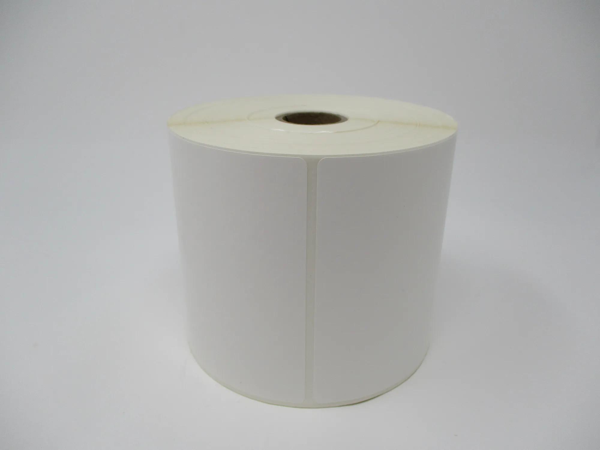 Brother white die-cut label roll on neutral background