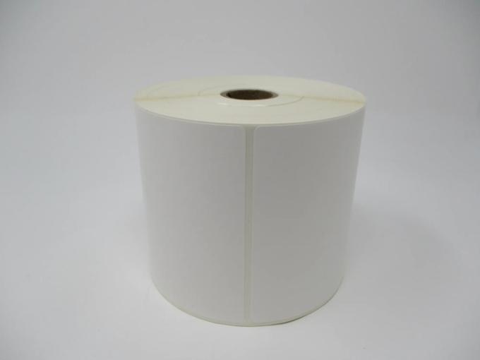 Brother white die-cut label roll on neutral background