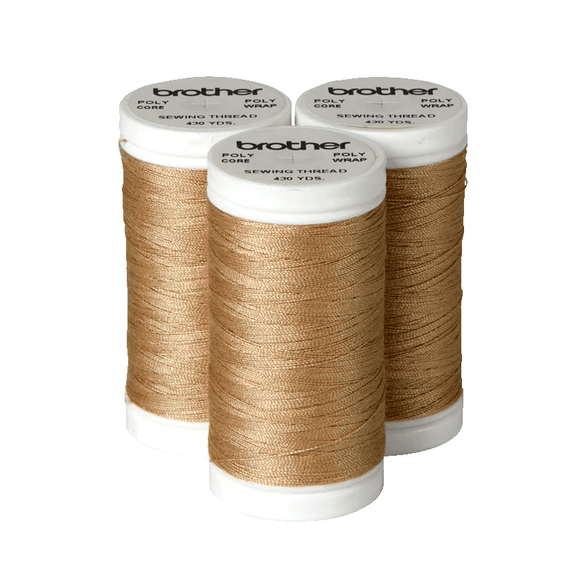 Brother polyester core sewing thread spools in gold, 430 yards each