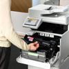 Brother MFC-L9610CDN color laser all-in-one printer with open toner compartment showing magenta cartridge