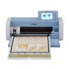 Brother SDX225F cutting machine with touchscreen display cutting floral pattern on mat
