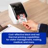 Brother QL-800 label printer printing visitor badge on wooden desk