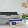 Brother HL-L2325dw monochrome laser printer with Refresh toner subscription box on desk