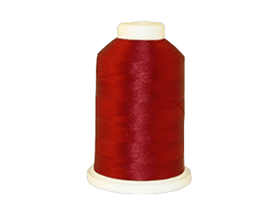 Brother embroidery thread spool in deep red on white background