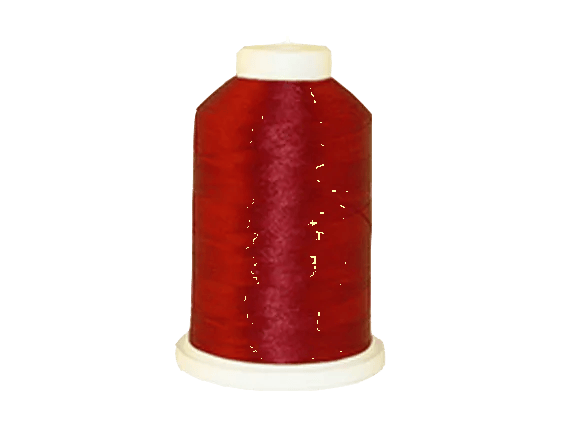 Brother embroidery thread spool in deep red on white background