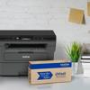 Brother HL-L2390DW monochrome laser printer with Refresh toner subscription box on desk