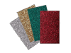 Brother glitter heat transfer sheets in silver, gold, teal, and red for custom fabric designs