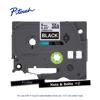 Brother P-touch TZe laminated label tape cartridge, 6mm, white on black with sample labels