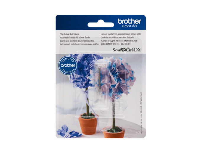Brother ScanNCut DX thin fabric auto blade packaging with decorative fabric flowers