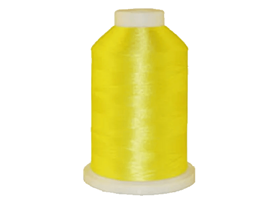 Brother yellow embroidery thread spool on white background