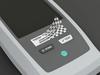 Impresora de etiquetas Brother imprimiendo etiqueta de activos con código de barras y código QR