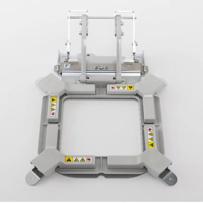 Brother embroidery machine frame with dual-position clamp system