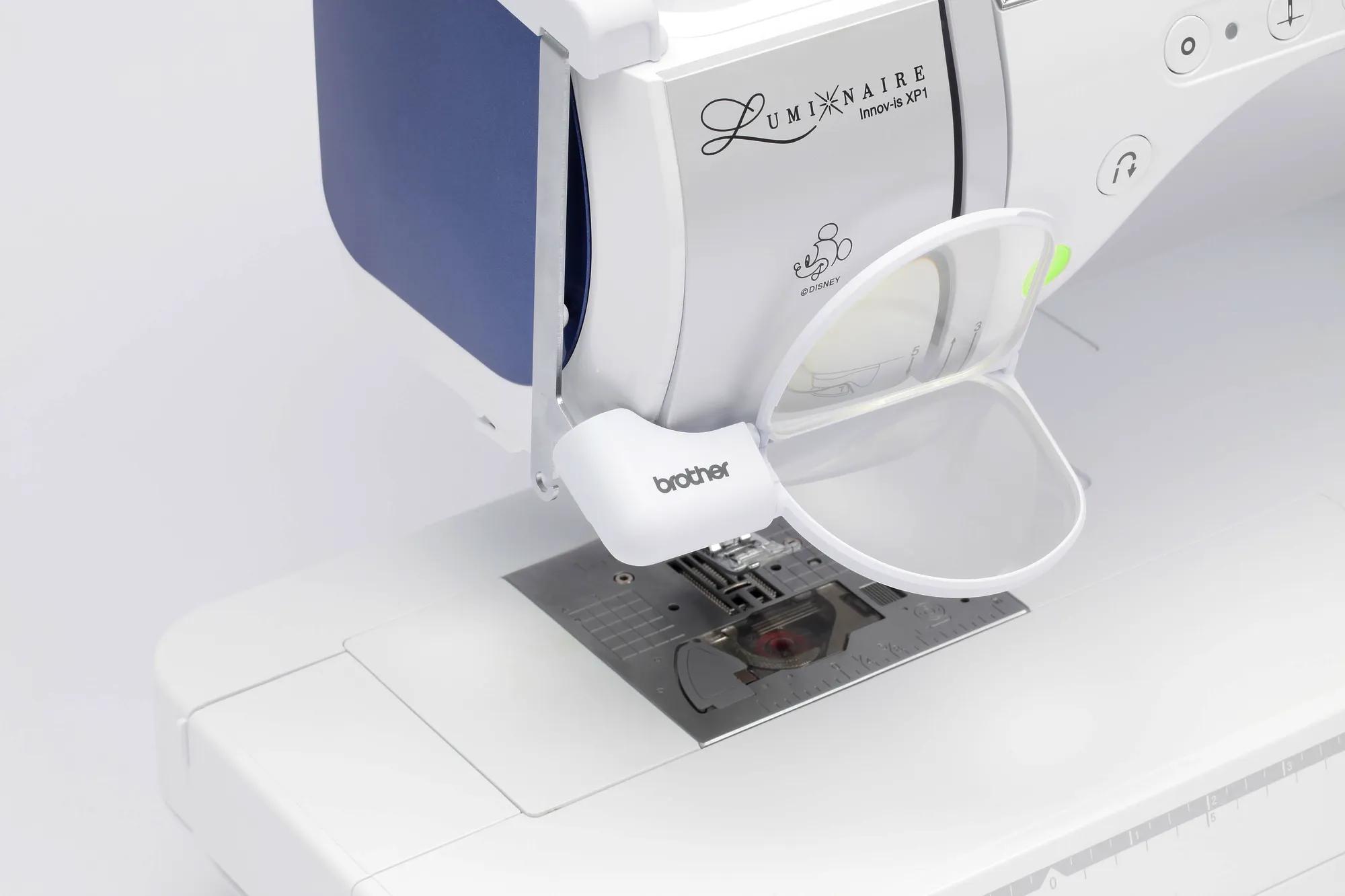 Brother Luminaire Innov-is XP1 embroidery machine with open magnetic hoop and Disney design