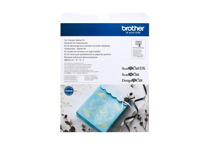 Brother foil transfer starter kit packaging with decorated blue journal and craft supplies