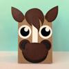 Cardboard horse craft with brown paper cutouts on mint green background