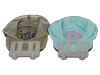 Two embroidered baseball caps with monograms displayed on cap organizing frames