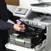 Brother MFC-L9670CDN color laser all-in-one printer with open toner cartridge compartment