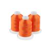 Three spools of dark orange embroidery thread on white bases