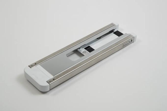 Brother printer tubular frame component with metal rails and white base