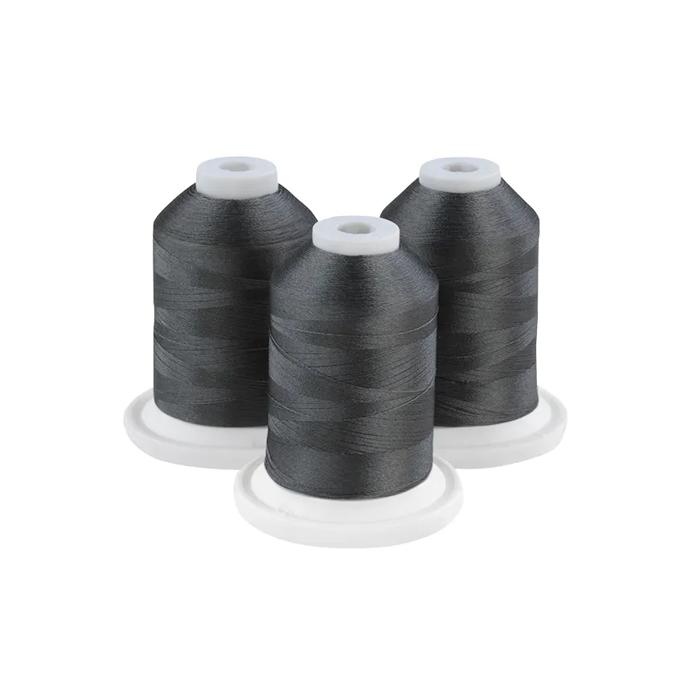 Three dark gray embroidery thread spools on white bases