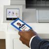 Hand scanning ID badge on Brother HL-EX470W wireless color laser printer with touchscreen