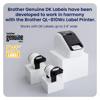 Brother QL-810W wireless label printer with genuine DK label rolls on white display