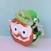 Paper craft leprechaun with green hat and shamrock decoration for St. Patrick's Day