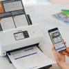 Brother ADS3350W desktop scanner with wireless connectivity scanning invoice to mobile device
