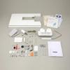 Brother BQ3100 sewing machine with included accessories and operation manual
