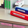 Brother wireless label maker organizing office binders and file drawer labels on desk